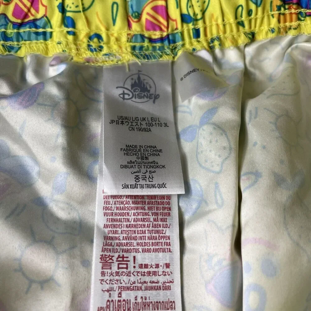 Disney Yellow Swim Trunks with Blue and Pink Accents - Picture 5 of 8